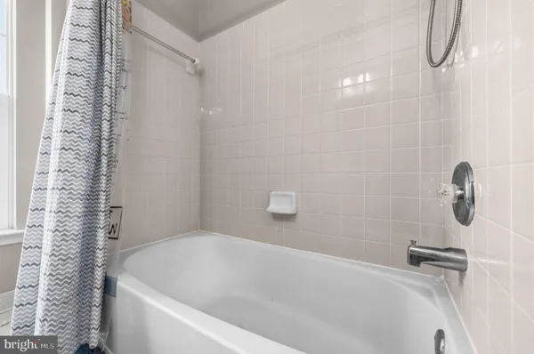 a bathroom with a bathtub