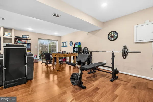a view of a livingroom with furniture and wooden floor
