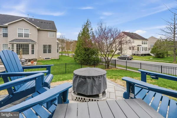 a view of a wooden deck and a yard