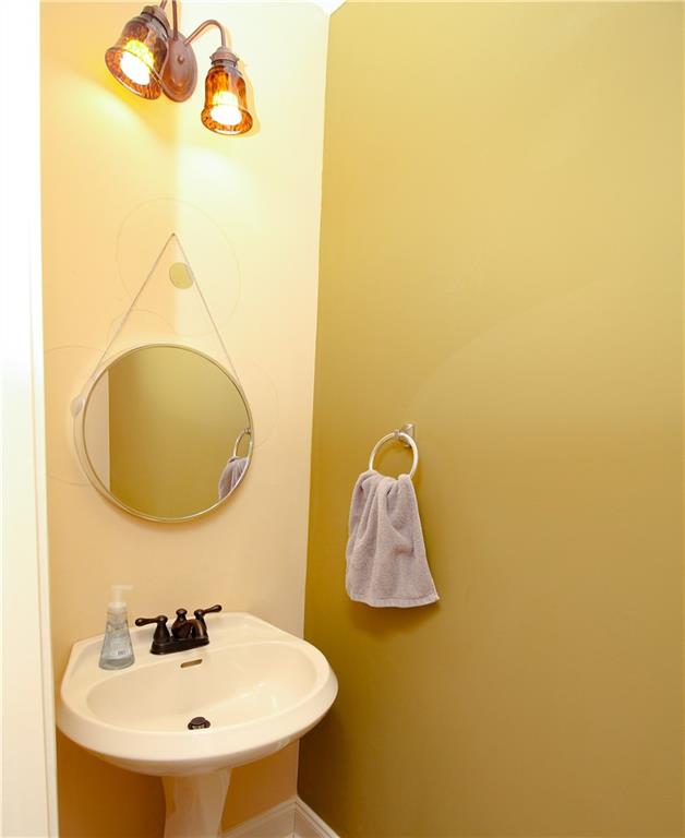 2508 Morgan Chase Drive Buford, GA 30519 - Photo 11 of 23 a bathroom with a sink and a mirror