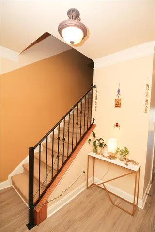 a view of entryway with wooden floor