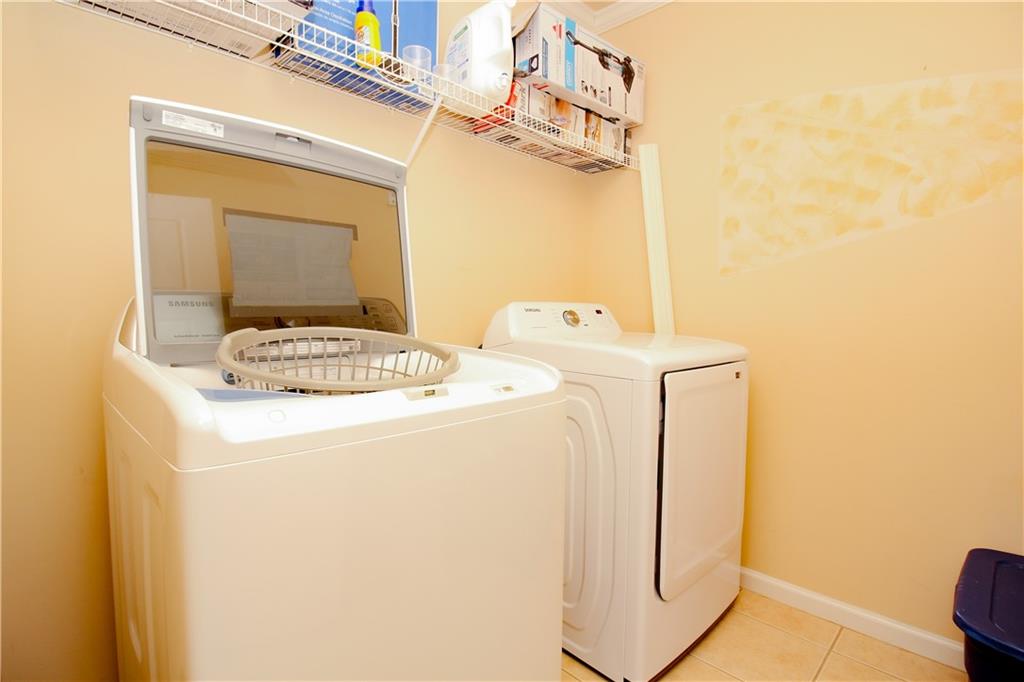 2508 Morgan Chase Drive Buford, GA 30519 - Photo 22 of 23 a utility room with dryer and washer