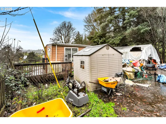 a balcony with a table and chairs