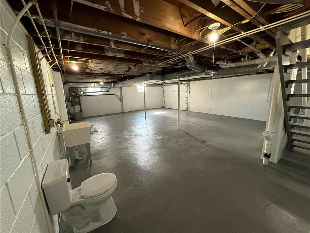 1433 Jones Street Monessen, PA 15062 - Photo 18 of 19 a bathroom with a toilet and a shower