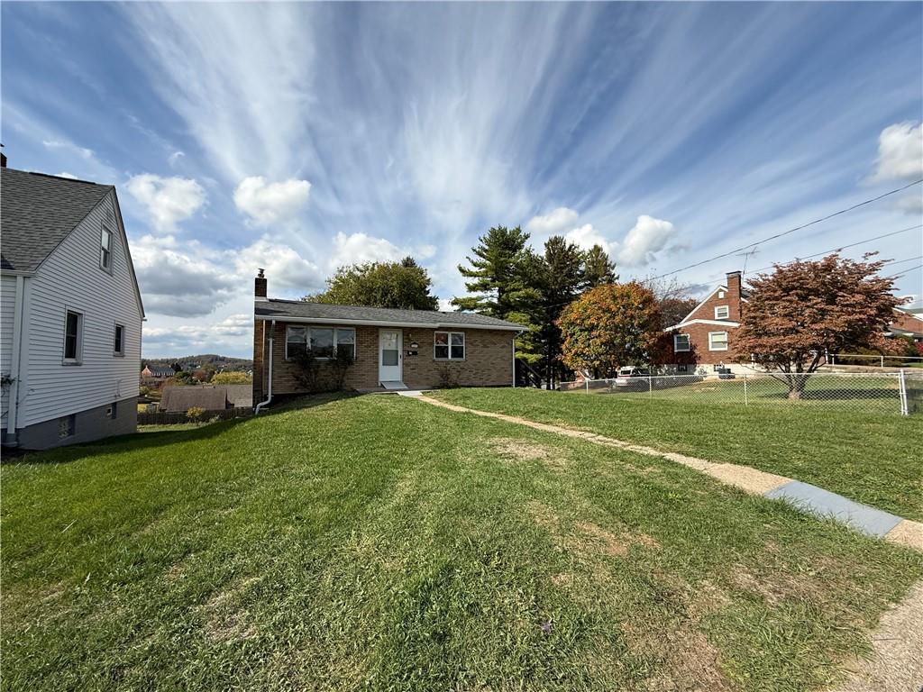 1433 Jones Street Monessen, PA 15062 - Photo 2 of 19 a view of a porch and garden