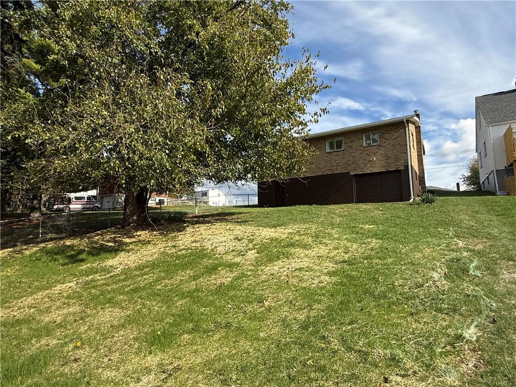 1433 Jones Street Monessen, PA 15062 - Photo 5 of 19 a view of a large garden with large trees