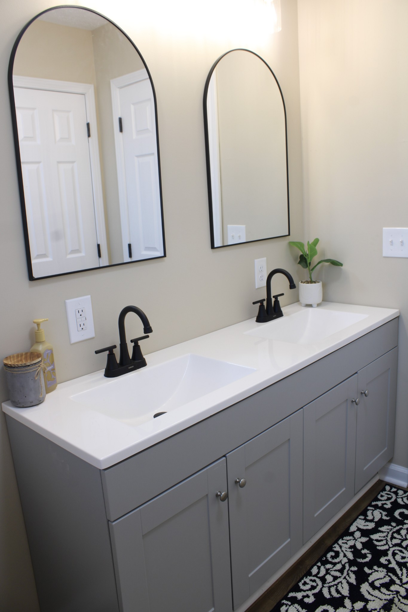 705 County House Road Sparta, TN 38583 - Photo 15 of 28 a bathroom with a double vanity sink and a mirror