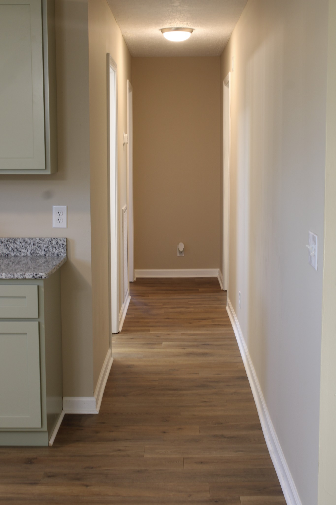 705 County House Road Sparta, TN 38583 - Photo 20 of 28 a view of a hallway with wooden floor