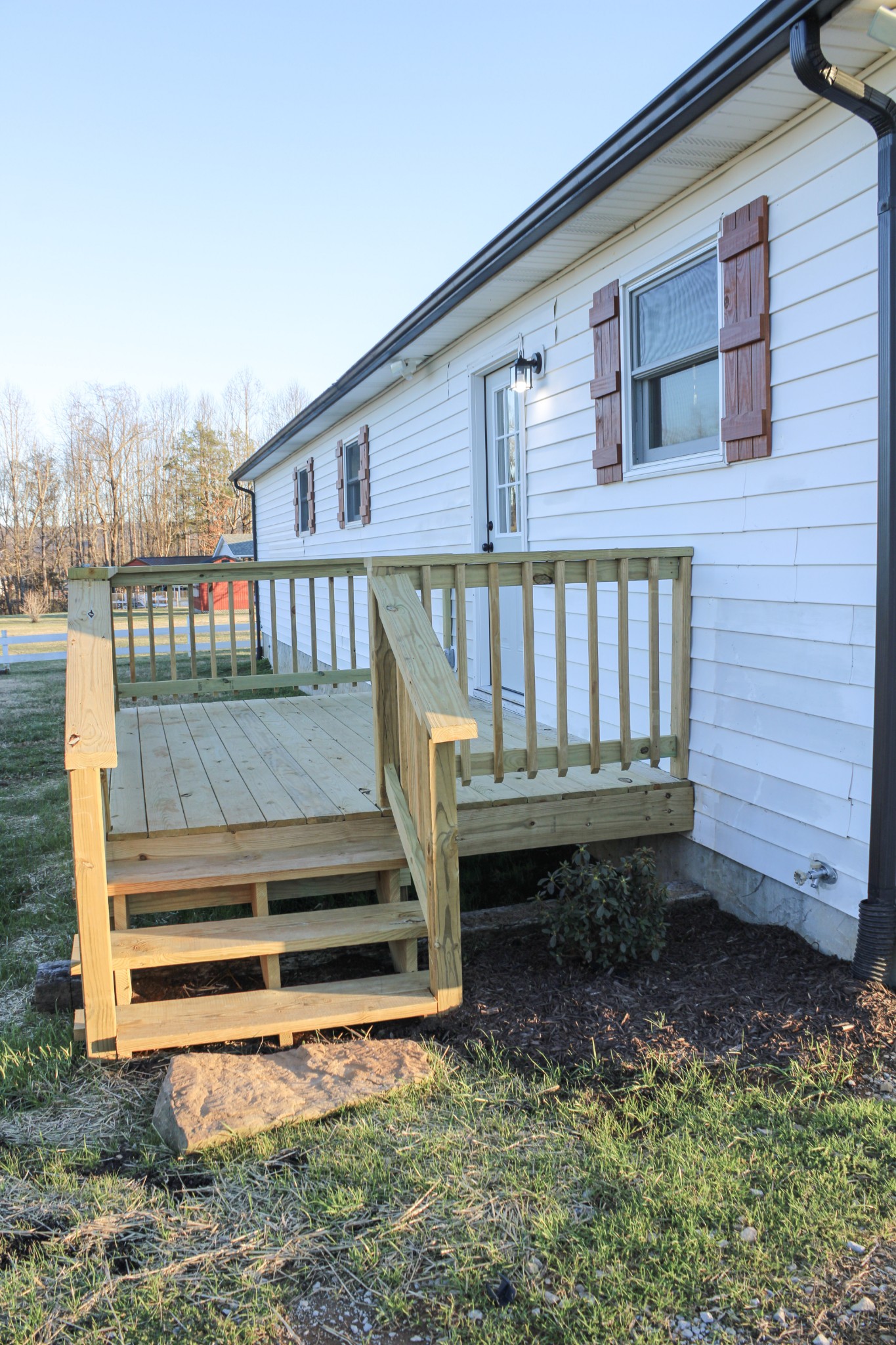 705 County House Road Sparta, TN 38583 - Photo 25 of 28 a view of a backyard with sitting area