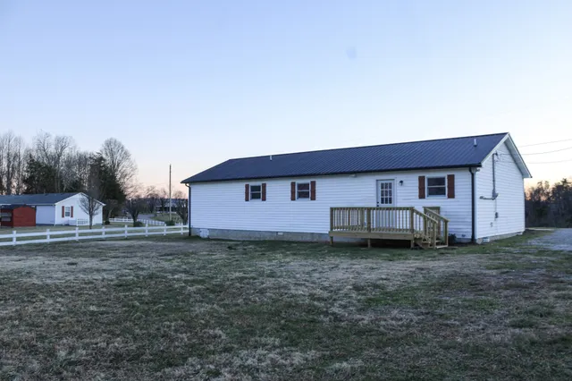 a house view with a backyard space