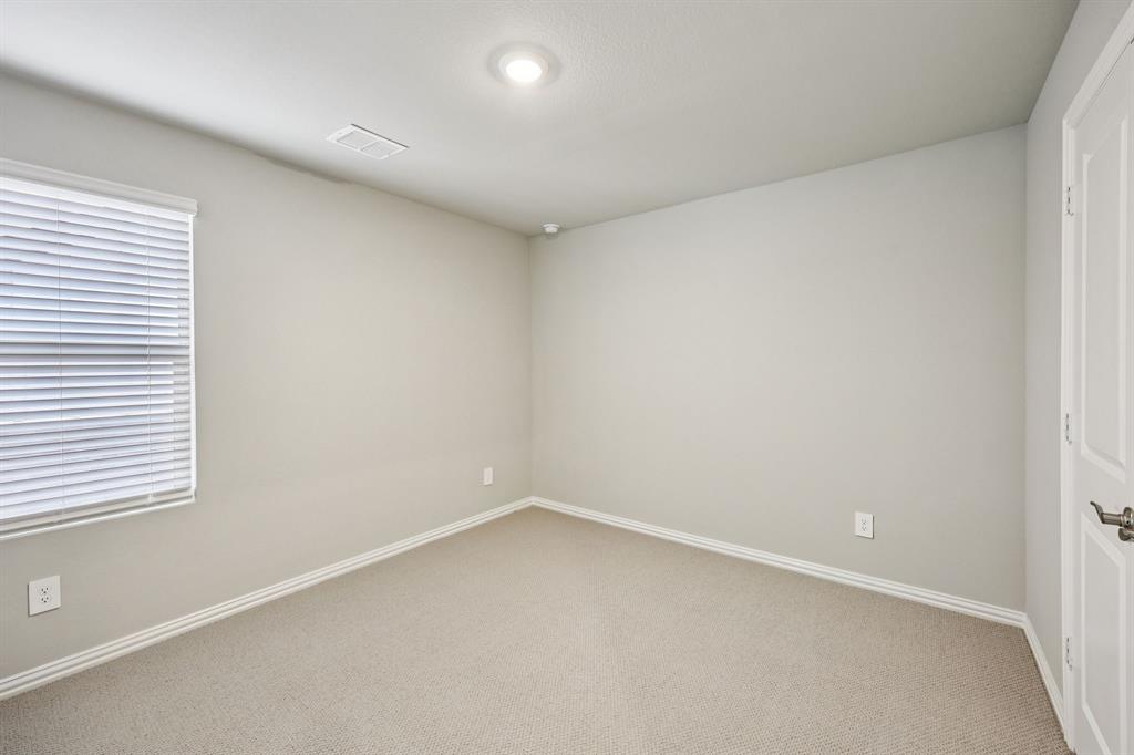 1721 Arches Road Anna, TX 75409 - Photo 35 of 39 an empty room with a window