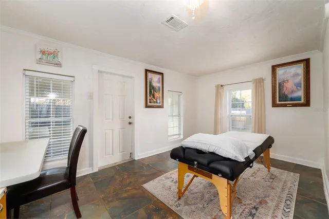 a view of a dining room with furniture