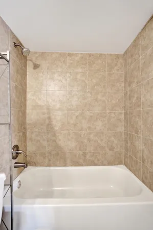 a bathroom with a bathtub