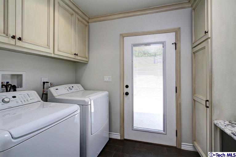 532 Alhambra Road San Gabriel, CA 91775 - Photo 13 of 28 a view of storage and utility room with washer and dryer