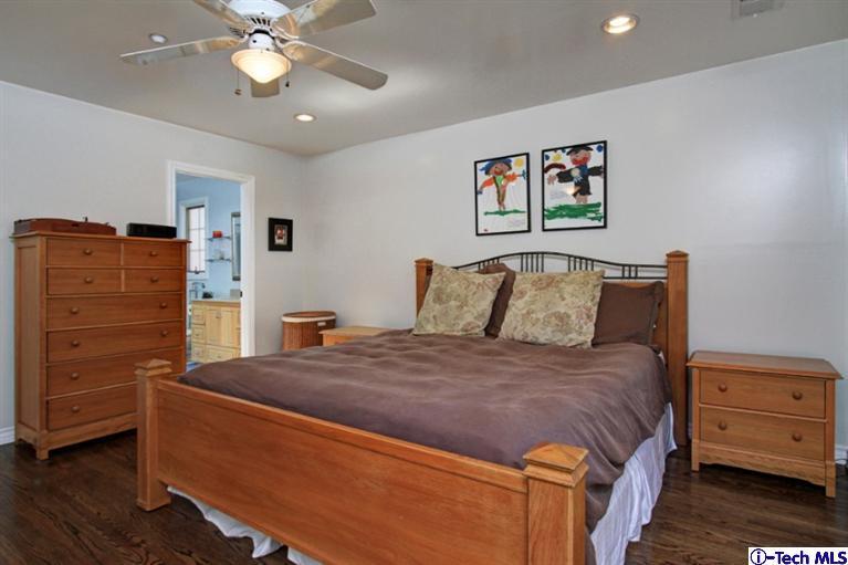 532 Alhambra Road San Gabriel, CA 91775 - Photo 15 of 28 a bedroom with a bed and cabinet