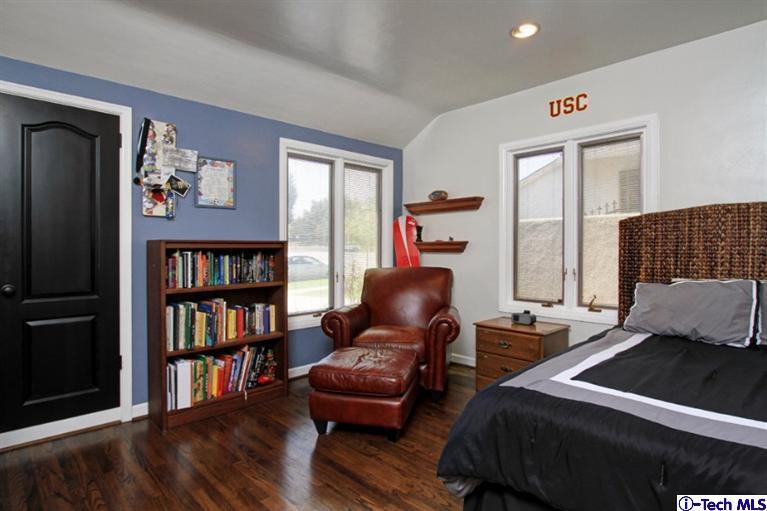 532 Alhambra Road San Gabriel, CA 91775 - Photo 17 of 28 a living room with a couch and a book shelf
