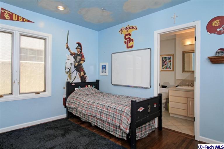 532 Alhambra Road San Gabriel, CA 91775 - Photo 19 of 28 a bedroom with a bed and a window