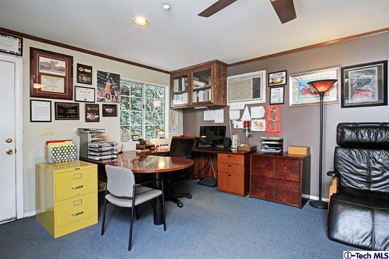 532 Alhambra Road San Gabriel, CA 91775 - Photo 21 of 28 a room with furniture a piano and a window