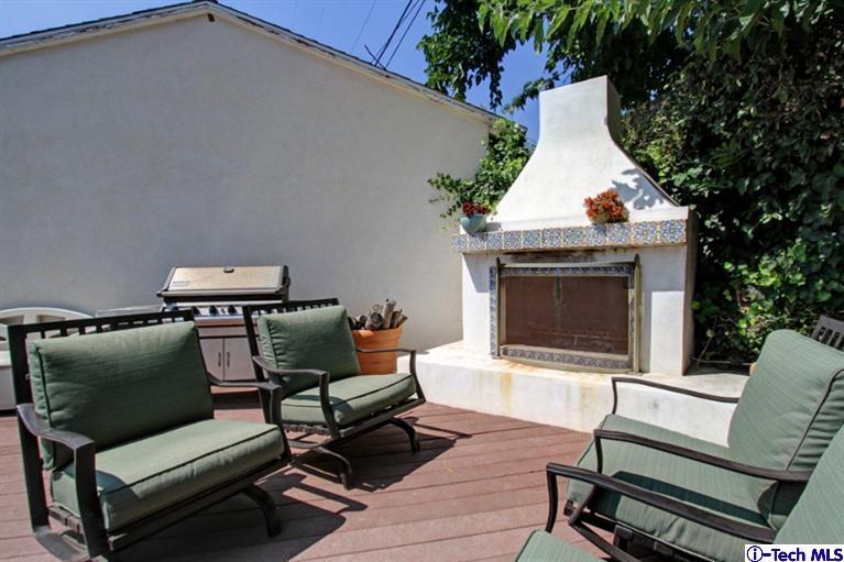 532 Alhambra Road San Gabriel, CA 91775 - Photo 26 of 28 a living room with furniture and a fireplace