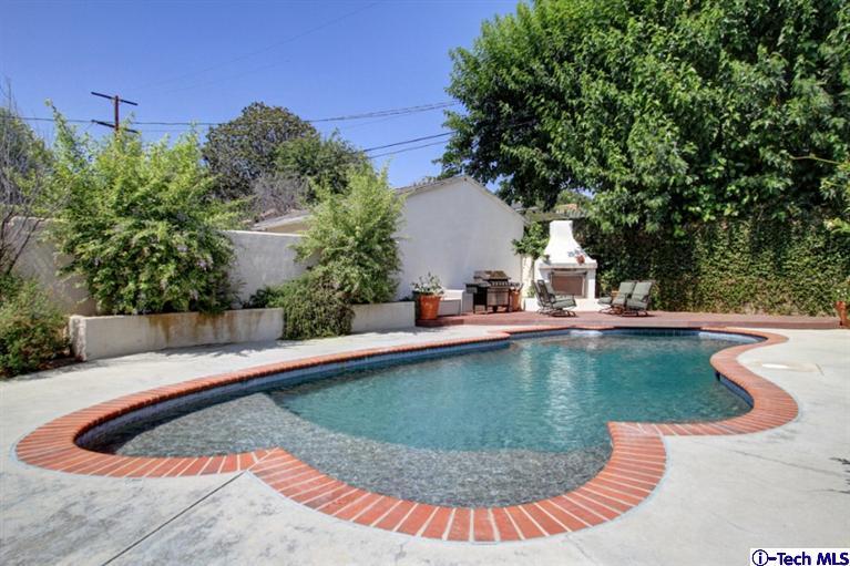 532 Alhambra Road San Gabriel, CA 91775 - Photo 27 of 28 a view of a swimming pool with a patio