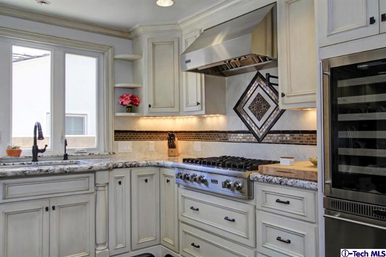 532 Alhambra Road San Gabriel, CA 91775 - Photo 10 of 28 a kitchen with granite countertop a stove a sink and a granite counter tops