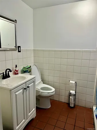 a bathroom with a sink and a toilet