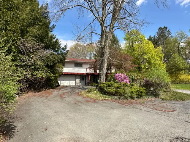 a house view with a street