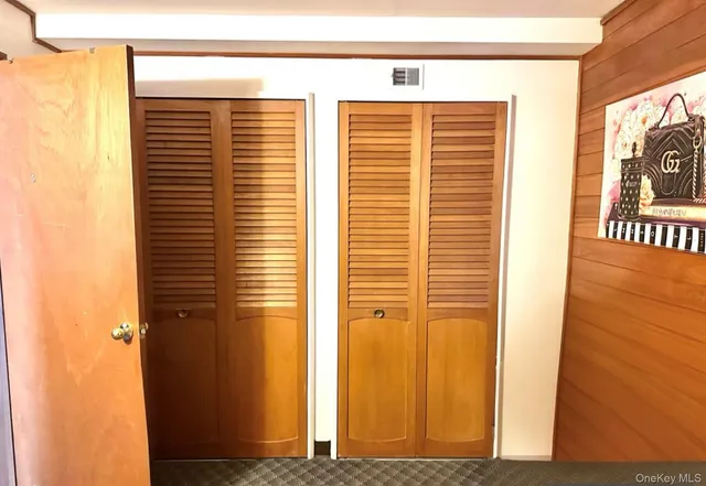 a view of empty room with floor to ceiling window