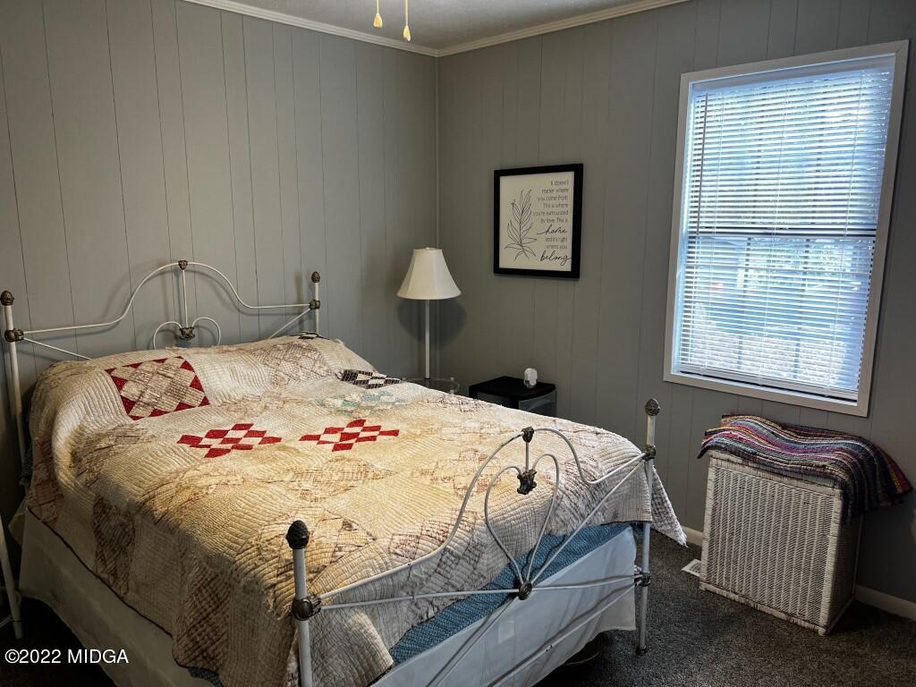 398 Old Benton Road Juliette, GA 31046 - Photo 22 of 31 a bedroom with a bed and a window