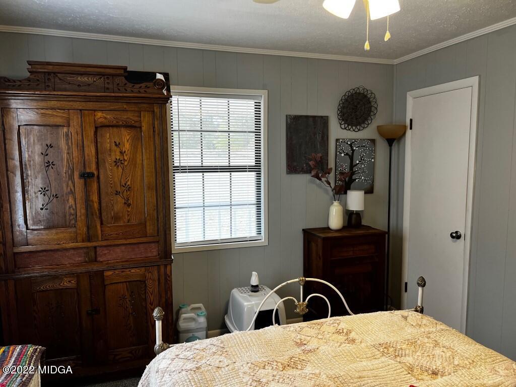 398 Old Benton Road Juliette, GA 31046 - Photo 23 of 31 a bathroom with a sink a large mirror and a window