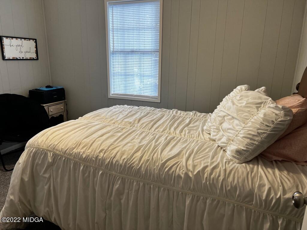 398 Old Benton Road Juliette, GA 31046 - Photo 26 of 31 a bedroom with a bed and a window