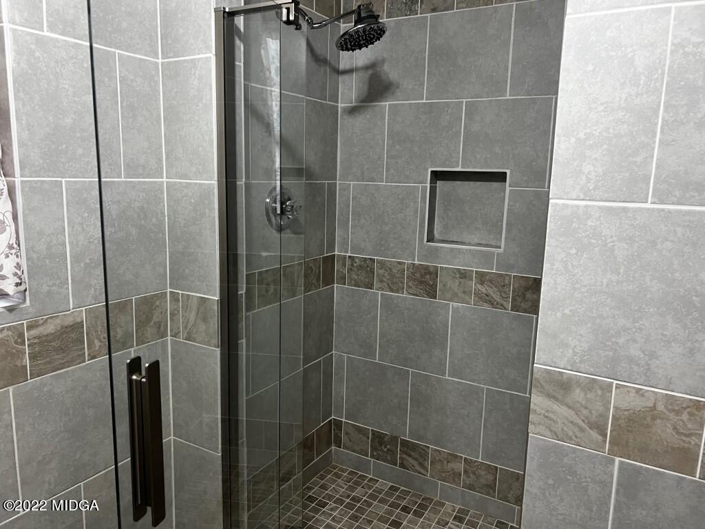 398 Old Benton Road Juliette, GA 31046 - Photo 29 of 31 a bathroom with a shower