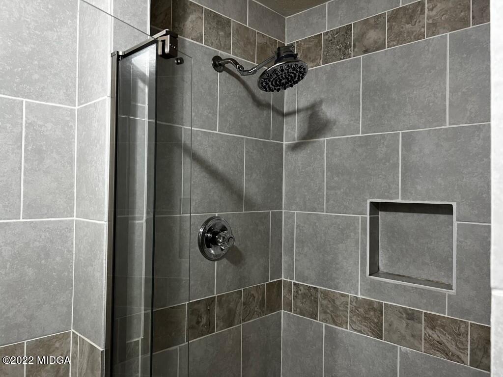 398 Old Benton Road Juliette, GA 31046 - Photo 30 of 31 a bathroom with a shower