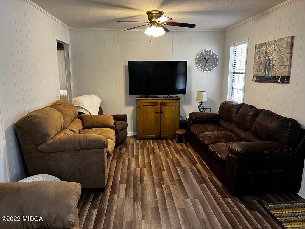 398 Old Benton Road Juliette, GA 31046 - Photo 6 of 31 a living room with furniture and a flat screen tv