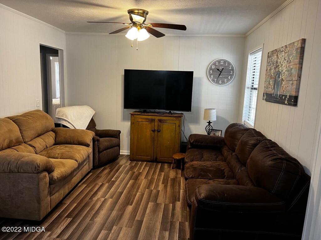 398 Old Benton Road Juliette, GA 31046 - Photo 7 of 31 a living room with furniture and a flat screen tv
