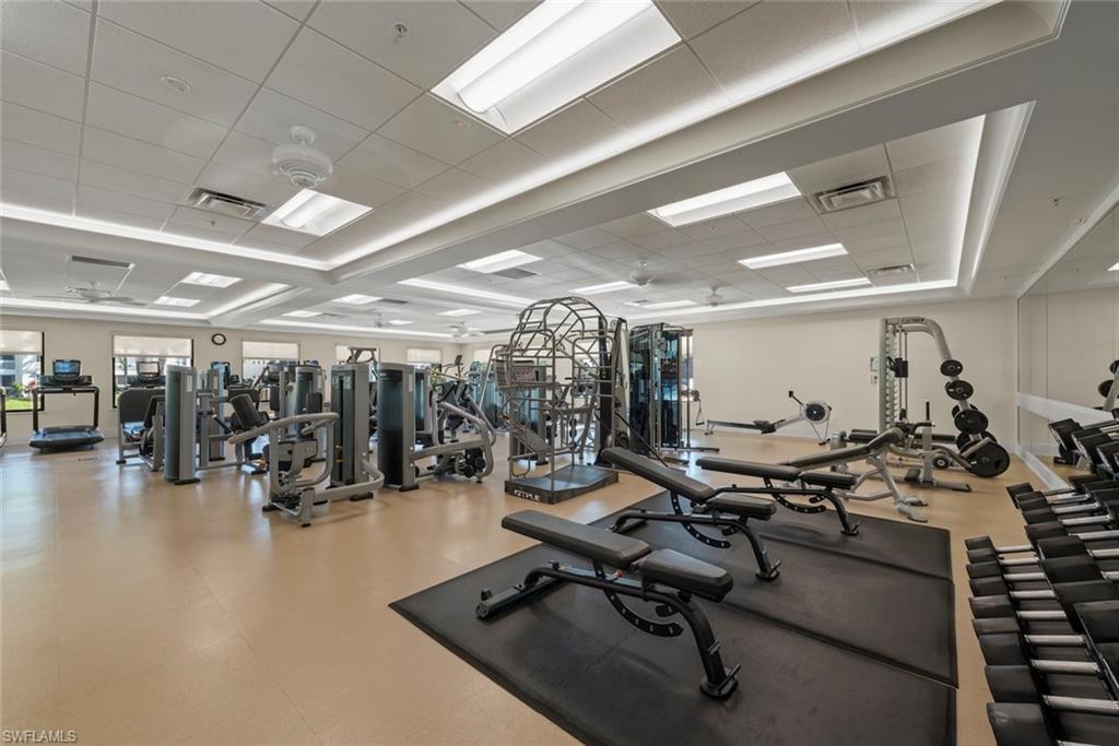 780 Waterford Drive, Unit 302 Naples, FL 34113 - Photo 39 of 47 a view of a room with gym equipment