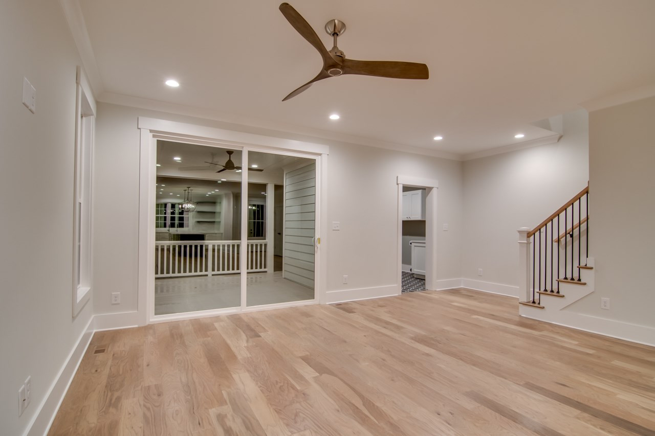 1006 Onslow Street Durham, NC 27705 - Photo 13 of 30 a view of empty room with wooden floor and fan