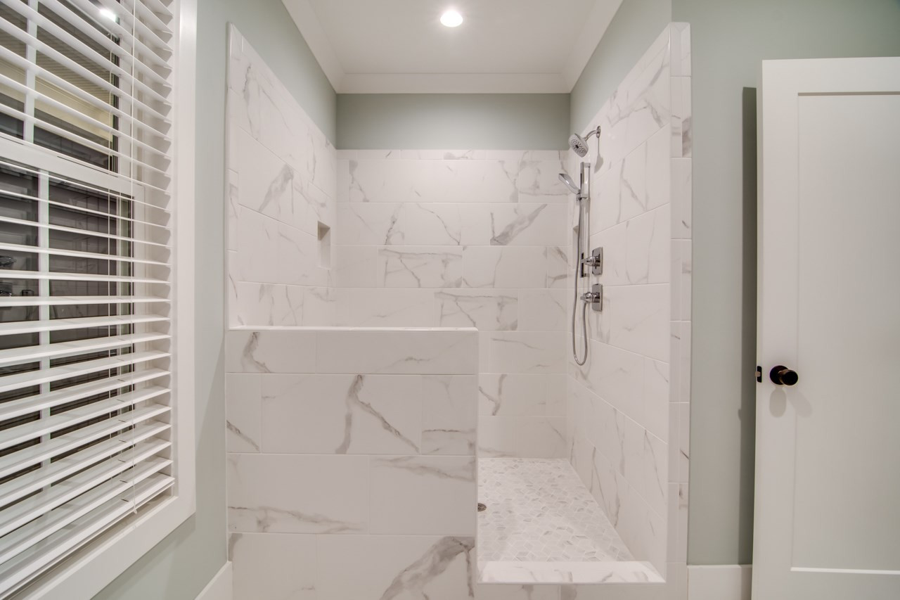 1006 Onslow Street Durham, NC 27705 - Photo 17 of 30 a bathroom with a shower