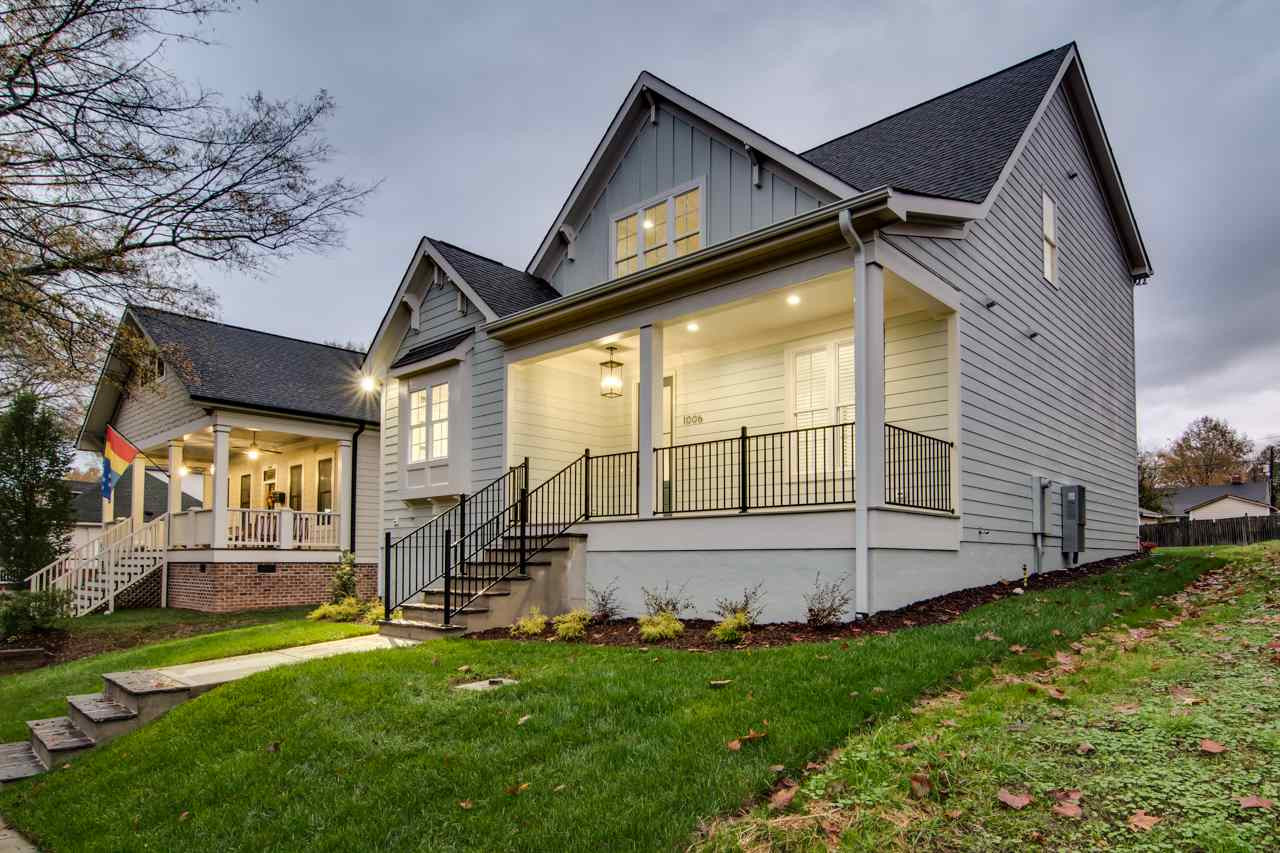 1006 Onslow Street Durham, NC 27705 - Photo 4 of 30 a view of an house with backyard and a tree