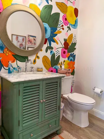 a bathroom with a sink and mirror