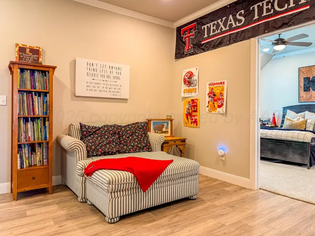 a bedroom with a bed and dresser