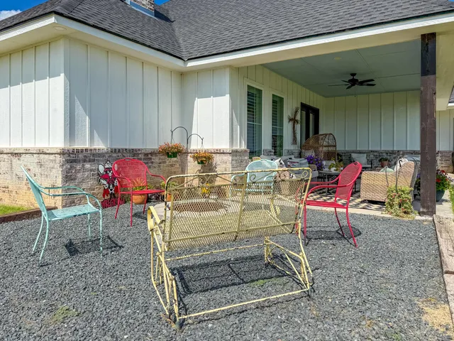 a view of a dinning tables and chairs in the patio