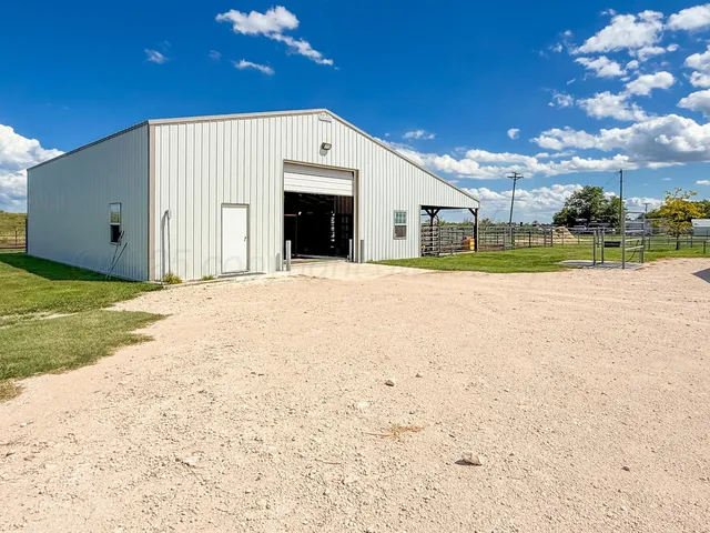 a view of an empty room with a garage