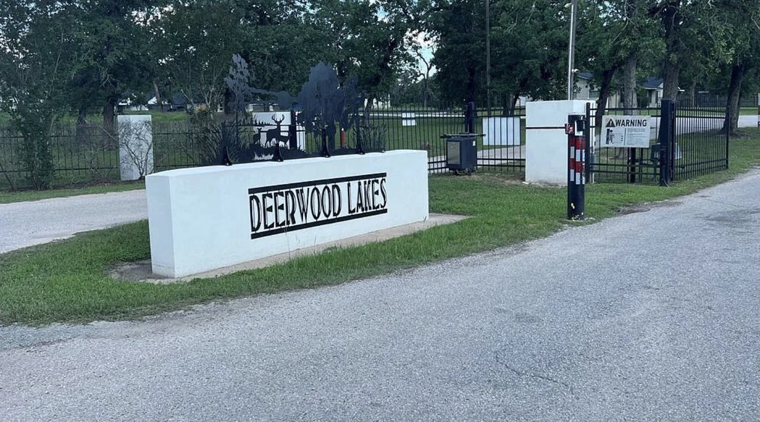 a view of a park with welcome board