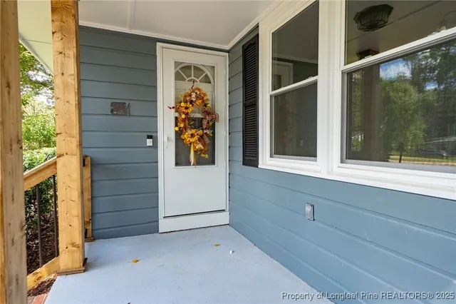 a view of front door and small window