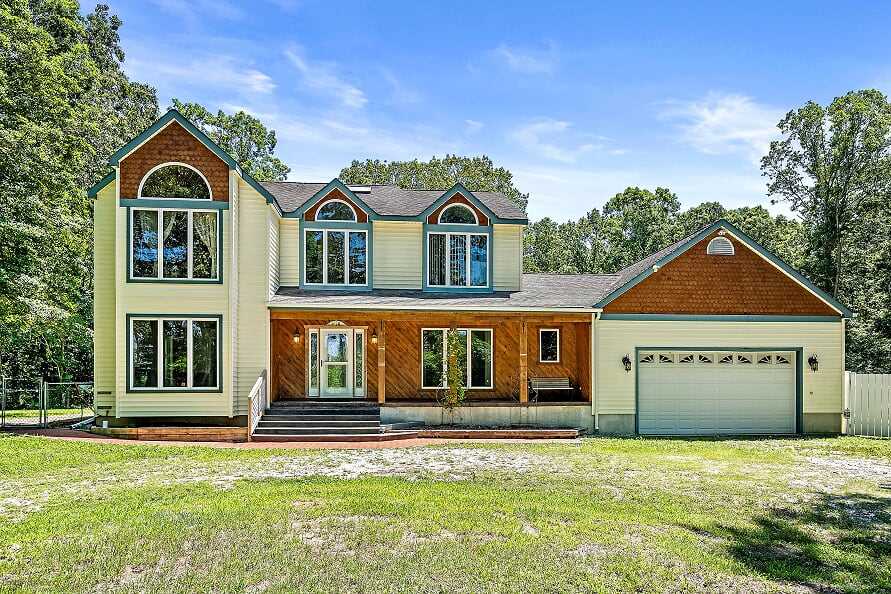 410 Breakwater Road Cape May, NJ 08204 - Photo 1 of 1 a front view of a house with a yard