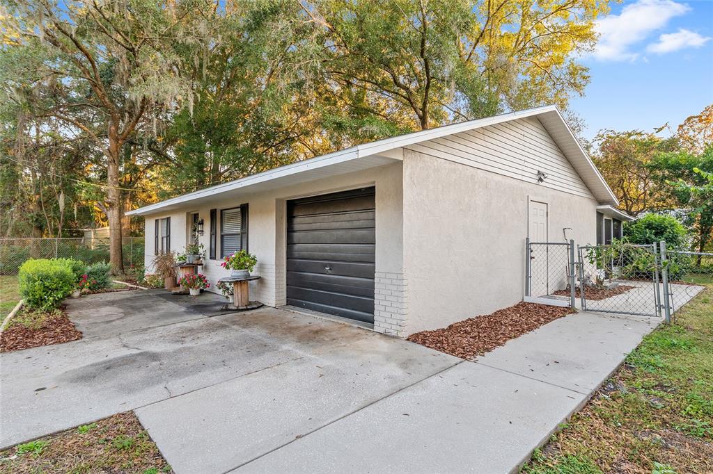 5300 Southeast 102nd Place Belleview, FL 34420 - Photo 34 of 41 a view of a house with a patio
