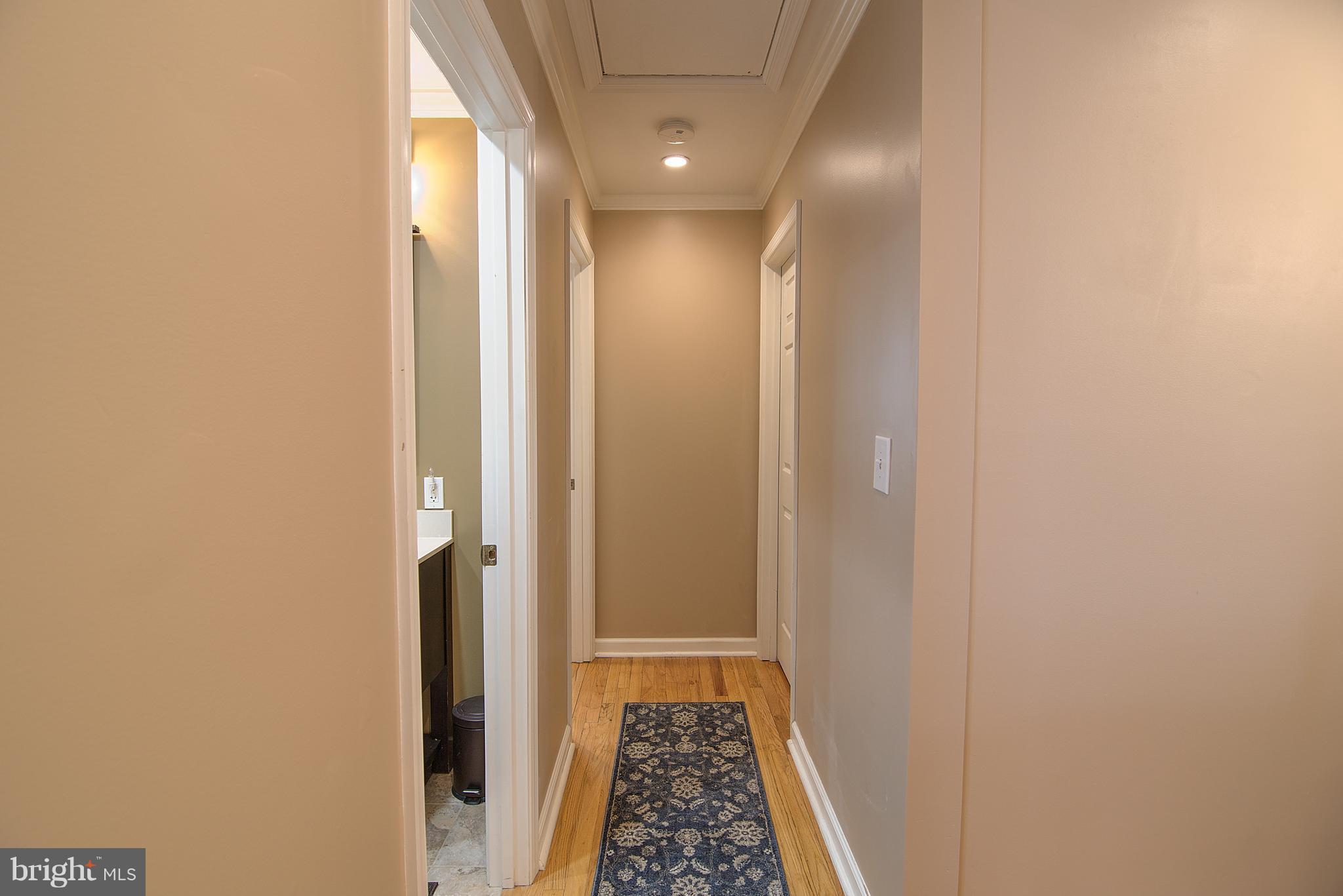 2 Oakmere Road Owings Mills, MD 21117 - Photo 14 of 30 Hallway and pull down attic stairs