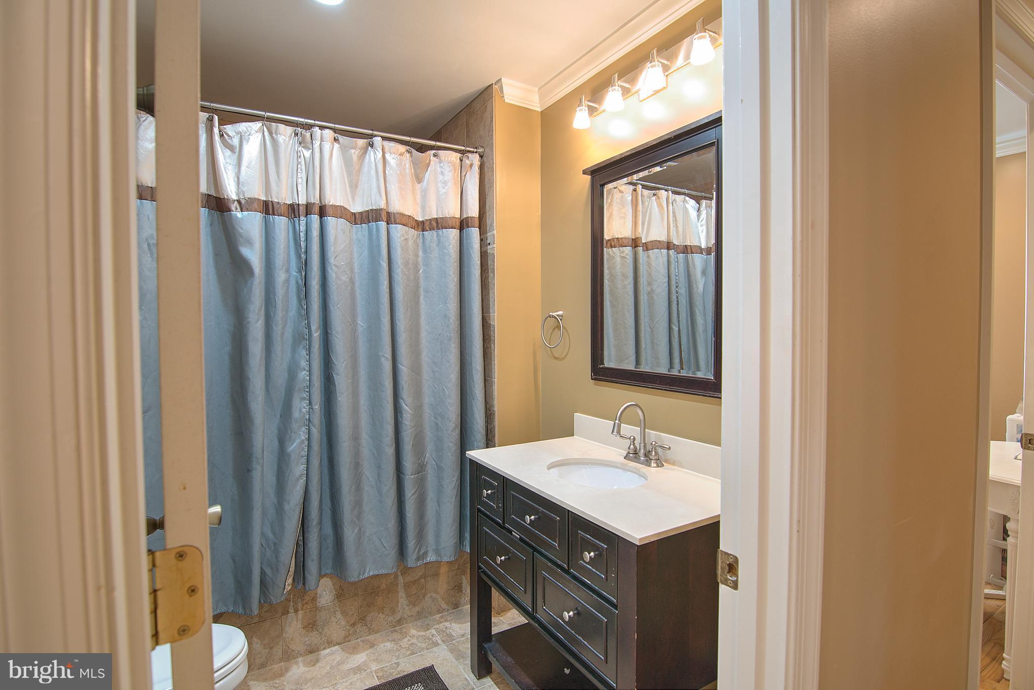 2 Oakmere Road Owings Mills, MD 21117 - Photo 15 of 30 Main level full bath