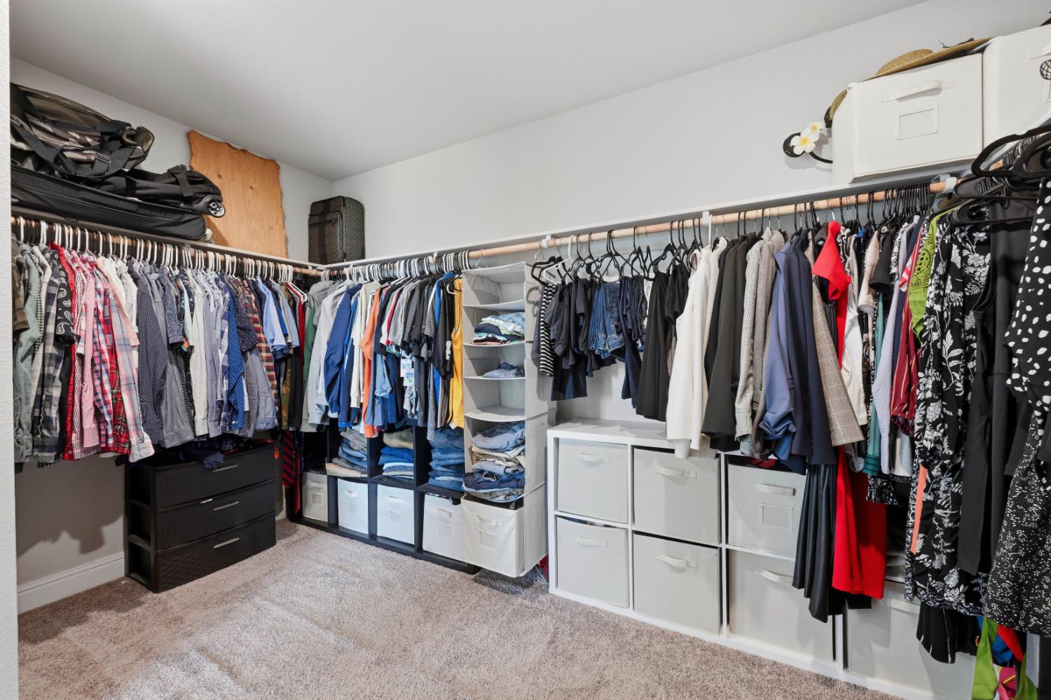 2012 Van Ruiten Drive Lodi, CA 95242 - Photo 33 of 49 a view of walk in closet with clothes and shoes